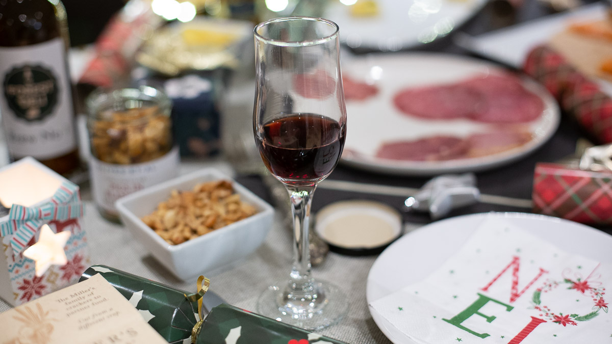 A Christmas Table with a glass of Port