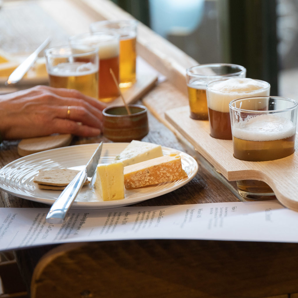 Cheese Tasting Plate with Paddle of Beer